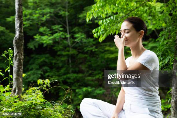 pranayama - pranayama stock pictures, royalty-free photos & images