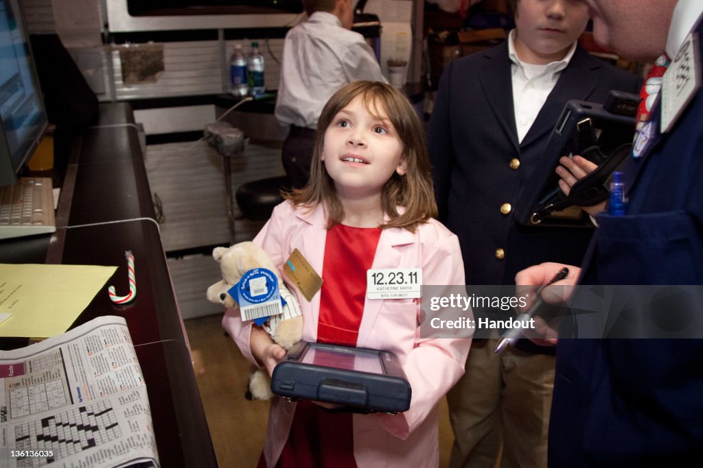Make-A-Wish Child Katherine Mara And Musician Jose Feliciano Ring The NYSE Closing Bell