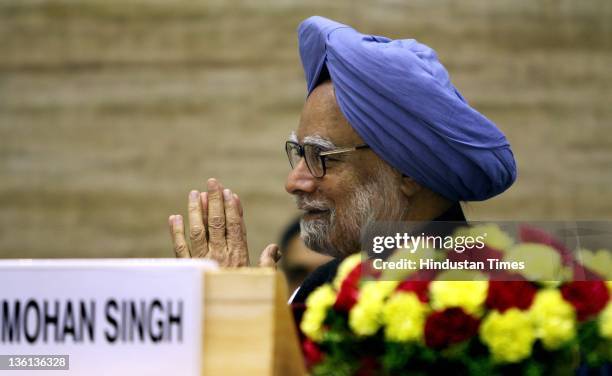 Prime Minister Manmohan Singh attends a function to commemorate 150th birth anniversary of Mahamana Madan Mohan Malaviya at Vigyan Bhawan on December...