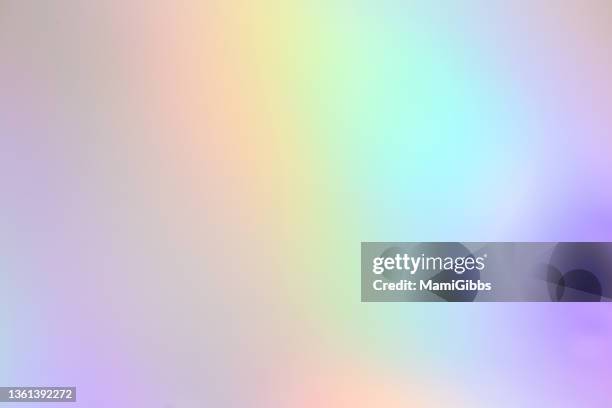 hologram paper gives off a rainbow color - hologramme photos et images de collection