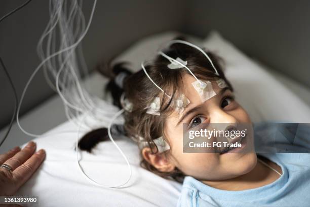 boy listening the doctor before polysomnography (sleep study) - brain activity stock pictures, royalty-free photos & images