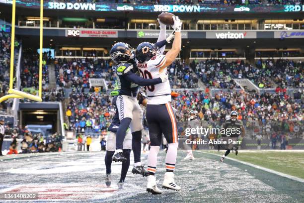 Jimmy Graham of the Chicago Bears catches the ball against John Reid of the Seattle Seahawks to bring Chicago within one point during the fourth...