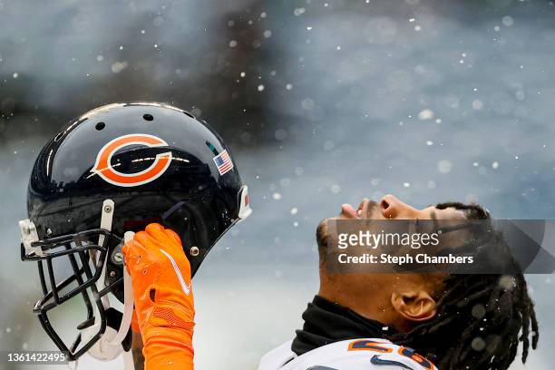 Deon Bush of the Chicago Bears puts his helmet on during pregame warm-ups before the game against the Seattle Seahawks at Lumen Field on December 26,...