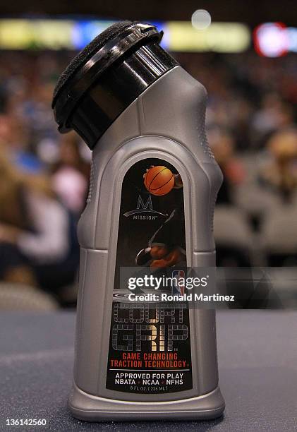 Bottle of Mission Court Grip on the scorer's table during a game between the Miami Heat and the Dallas Mavericks at American Airlines Center on...