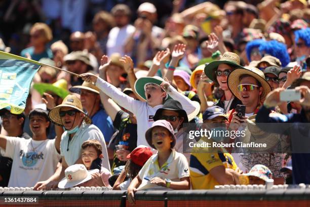 Fans enjoy the atmosphere during day three of the Third Test match in the Ashes series between Australia and England at Melbourne Cricket Ground on...