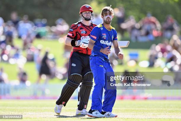 Henry Nicholls of the Kings and Michael Rippon of the Volts look on during the Super Smash Men's T20 match between the Canterbury Kings and the Otago...