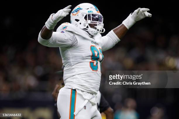 Emmanuel Ogbah of the Miami Dolphins reacts after getting a sack in the fourth quarter of the game against the New Orleans Saints at Caesars...