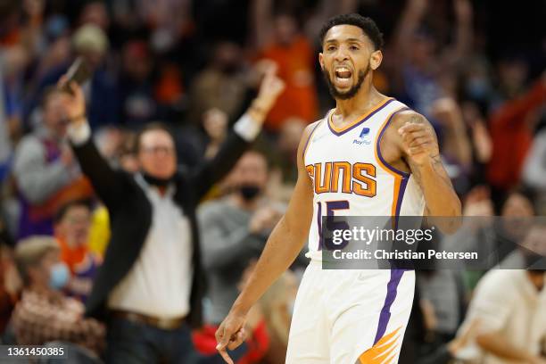 Cameron Payne of the Phoenix Suns celebrates after a three-point shot against the Memphis Grizzlies during the second half of the NBA game at...