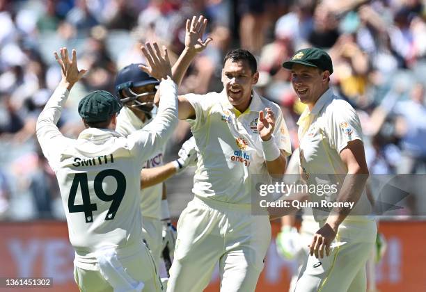 Scott Boland of Australia celebrates with teammates after dismissing Jonny Bairstow of England during day three of the Third Test match in the Ashes...