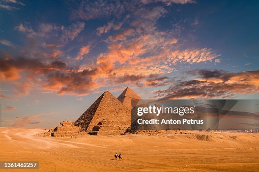 Great Pyramid of Cheops at sunset. Giza, Cairo, Egypt Great Pyramid of Cheops at sunset. Giza, Cairo, Egypt