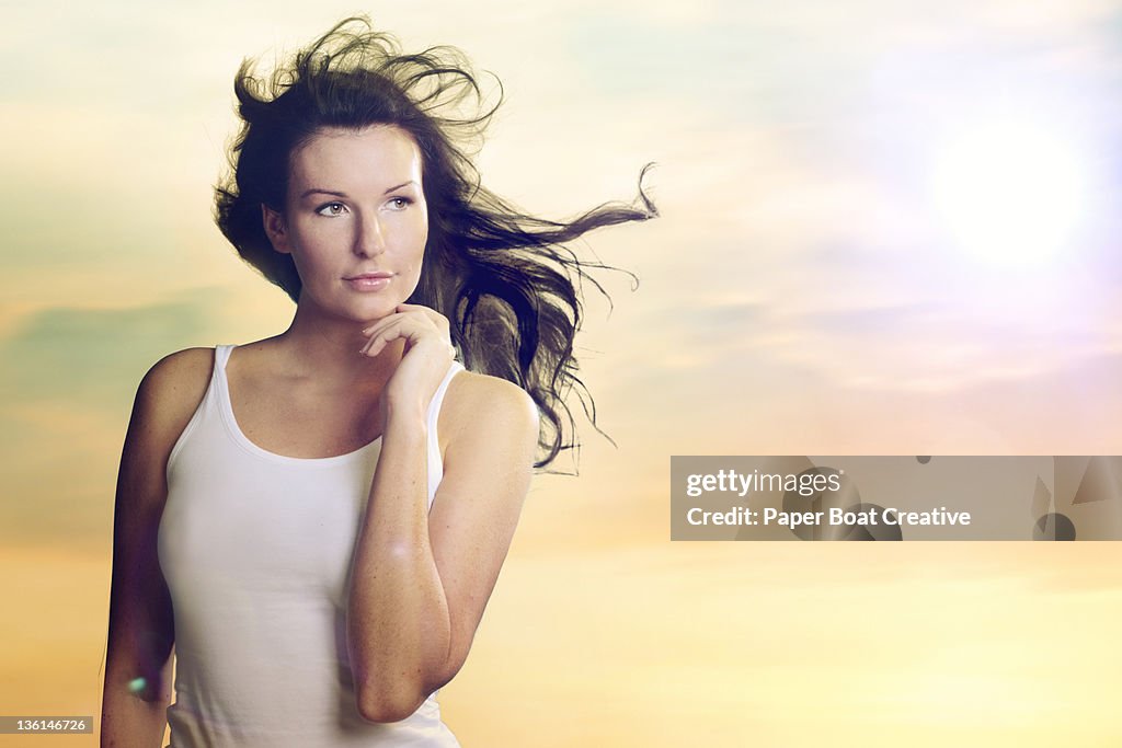 Portrait of a young woman outdoors in the morning