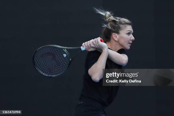 Simona Halep of Romania practices on centre court during a practice session at Rod Laver Arena at Melbourne Park on December 28, 2021 in Melbourne,...