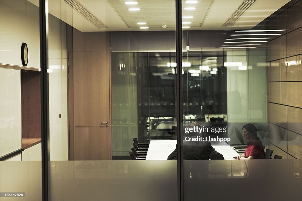 Two business people having a meeting