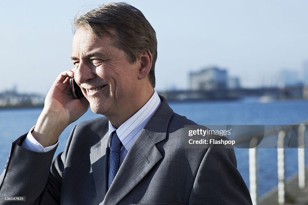 Business man using mobile phone