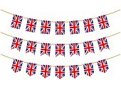United Kingdom flag on the ropes on white background. Set of Patriotic bunting flags. Bunting decoration of United Kingdom flag