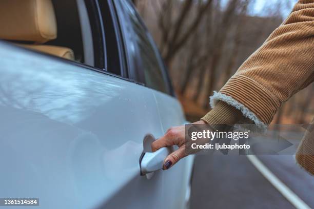 opening car door - opening car door stock pictures, royalty-free photos & images