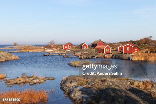 Small cottages in autumn i archipelago Small cottages in autumn i archipelago