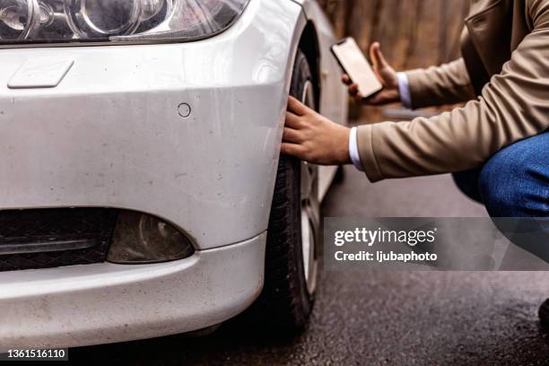 car problems - flat tyre stock pictures, royalty-free photos & images