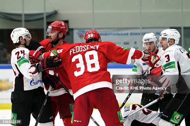 Alexander Popov of the Avangard and Nick Tarnasky of the Vityaz are sorting things out during the game between Avangard Omsk region and Vityaz...