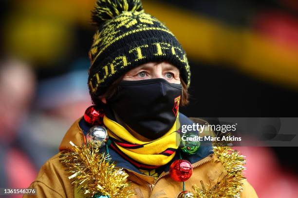 Fan of Watford looks on ahead of the Premier League match between Watford and West Ham United at Vicarage Road on December 28, 2021 in Watford,...