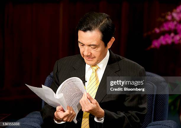 Ma Ying-jeou, Taiwan's president, looks at documents during an interview at the Presidential Palace in Taipei, Taiwan, on Friday, Dec. 22, 2011. Ma...