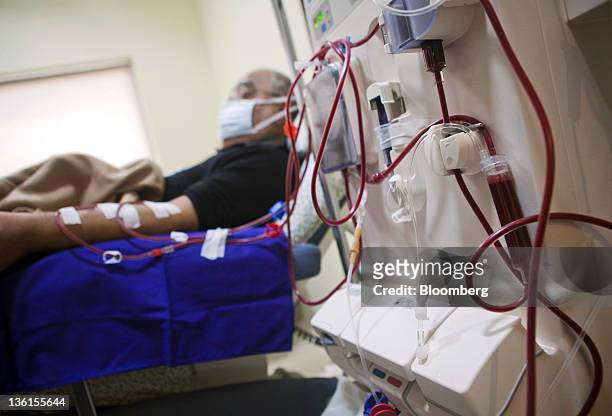Patient undergoes dialysis, aided by a Fresenius Medical Care AG machine, at a Fortis Healthcare India Ltd. Renkare dialysis clinic in New Delhi,...