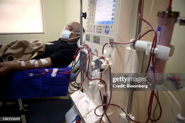 Patient undergoes dialysis, aided by a Fresenius Medical Care AG machine, at a Fortis Healthcare India Ltd. Renkare dialysis clinic in New Delhi,...