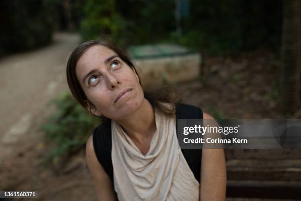 woman traveller in botanical garden - israeli woman stock pictures, royalty-free photos & images