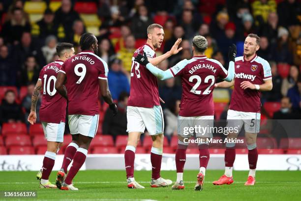 Tomas Soucek of West Ham United celebrates after scoring their sides first goal with team mate Said Benrahma during the Premier League match between...