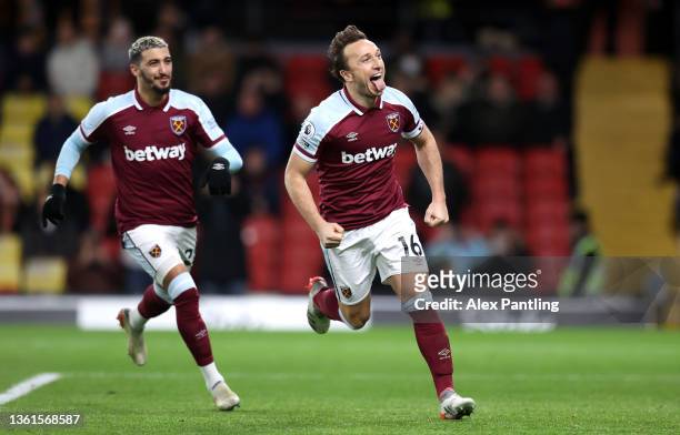 Mark Noble of West Ham United celebrates after scoring their sides third goal from the penalty spot during the Premier League match between Watford...
