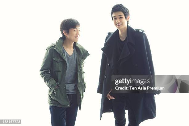 Noh Young-Hak and Choi Woo-Sik pose for photographs on March 11, 2011 in Seoul, South Korea.