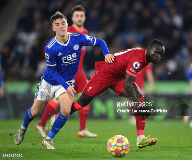 Sadio Mane of Liverpool and Luke Thomas of Leicester City battle for possession during the Premier League match between Leicester City and Liverpool...