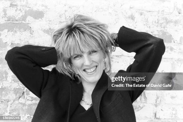 Country singer Lucinda Williams poses for a portrait in July 1990 in Lenox, Massachusetts.