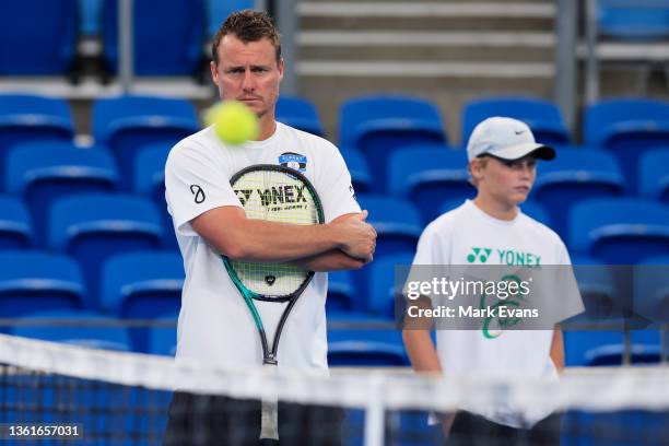 Australia Coach Lleyton Hewitt looks on with son Cruz during a Alex De Minaura practice session ahead of the 2022 ATP Cup at Ken Rosewall Arena on...