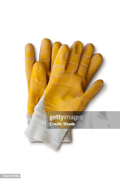 yellow work gloves with clipping path - gardening glove stock pictures, royalty-free photos & images