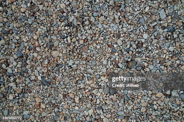 bird's eye view of gravel ground - gravel stock pictures, royalty-free photos & images