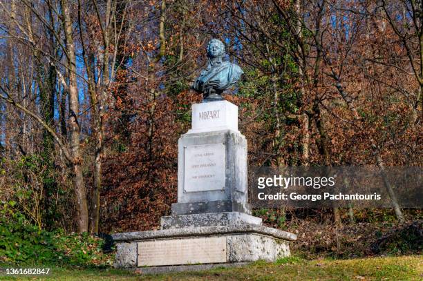 monument of mozart on the kapuzinerberg hill in salzburg, austria - mozart stock pictures, royalty-free photos & images