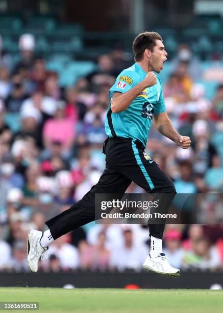 Xavier Bartlett of the Heat celebrates after claiming the wicket of James Vince of the Sixers during the Men's Big Bash League match between the...