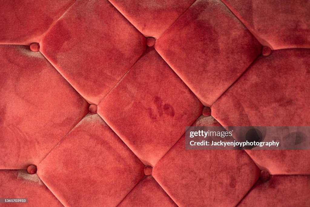 Full Frame Shot Of Red Velvet Sofa