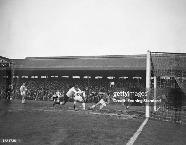 British footballer Maurice Cook of Fulham, British footballer Graham Williams of West Brom, and British goalkeeper Ray Potter of West Brom in action...