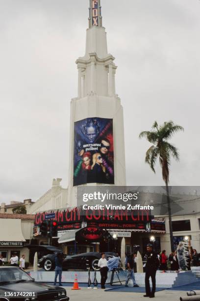 The Batmobile for 'Batman & Robin' on display outside Mann's Village and Bruin Theater ahead of the film's world premiere at the Fox Theater in the...