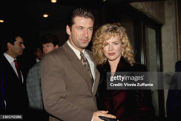 American actor Alec Baldwin and American actress Kim Basinger attend the Westwood premiere of 'Final Analysis', held at the Mann Bruin Theatre in Los...