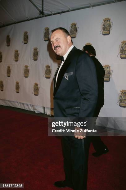 Former American Football player Dick Butkus, wearing a tuxedo and bow tie, attends the Sports Illustrated 20th Century Sports Awards, held at Madison...