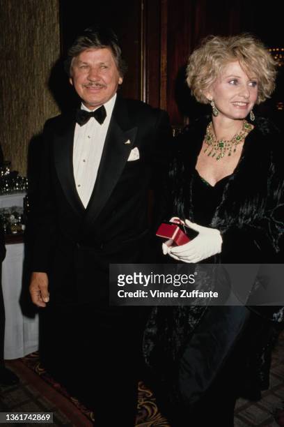 American actor Charles Bronson and his wife, British actress Jill Ireland attend the Crystal Ball Benefit for St John's Hospital & Health, held at...
