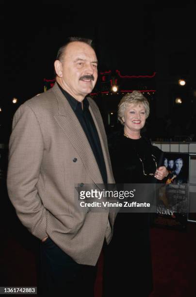 Former American Football player Dick Butkus and his wife Helen attend the Westwood premiere of 'Any Given Sunday' held at the Mann Village Theater in...