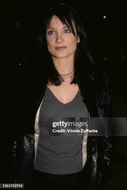 American singer-songwriter and guitarist Meredith Brooks, wearing a grey sweater beneath a black leather jacket, attends the MTV 'Rock the Vote'...