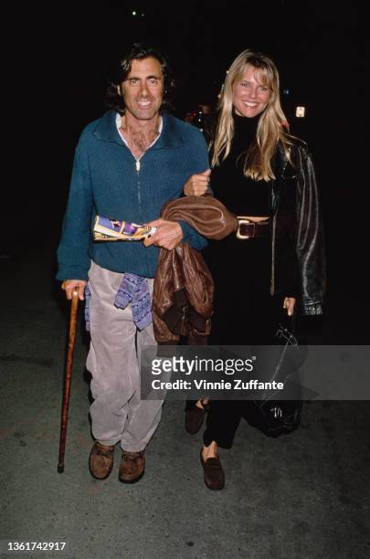 American property developer Richard Taubman and his fiancee, American fashion model Christie Brinkley attend the opening night performance of Cirque...