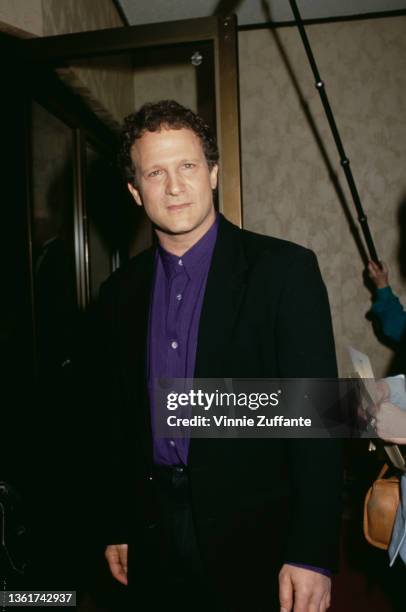 American actor, comedian and film director Albert Brooks attends the Westwood premiere of 'Defending Your Life', held at the Mann Bruin Theater in...