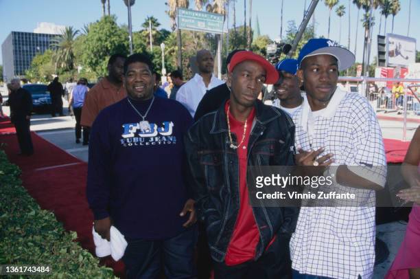 Barbadian-American DJ and rapper Grandmaster Flash with men at the 1999 Source Hip-Hop Music Awards, held at the Pantages Theatre in Los Angeles,...