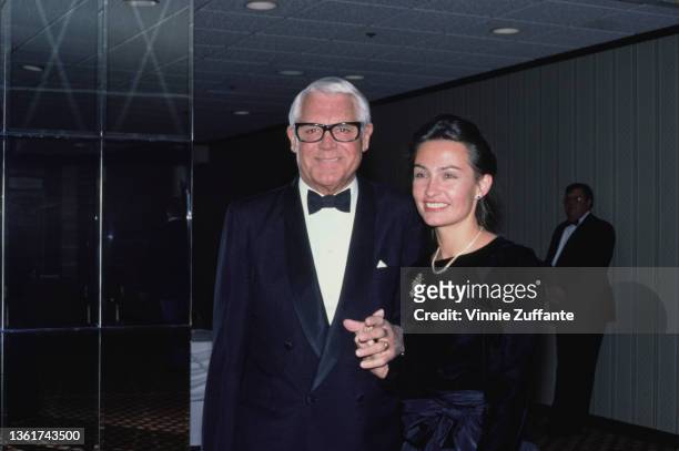 British-American actor Cary Grant and his wife, British public relations agent Barbara Harris, attend a party in Grant's honour in Los Angeles,...